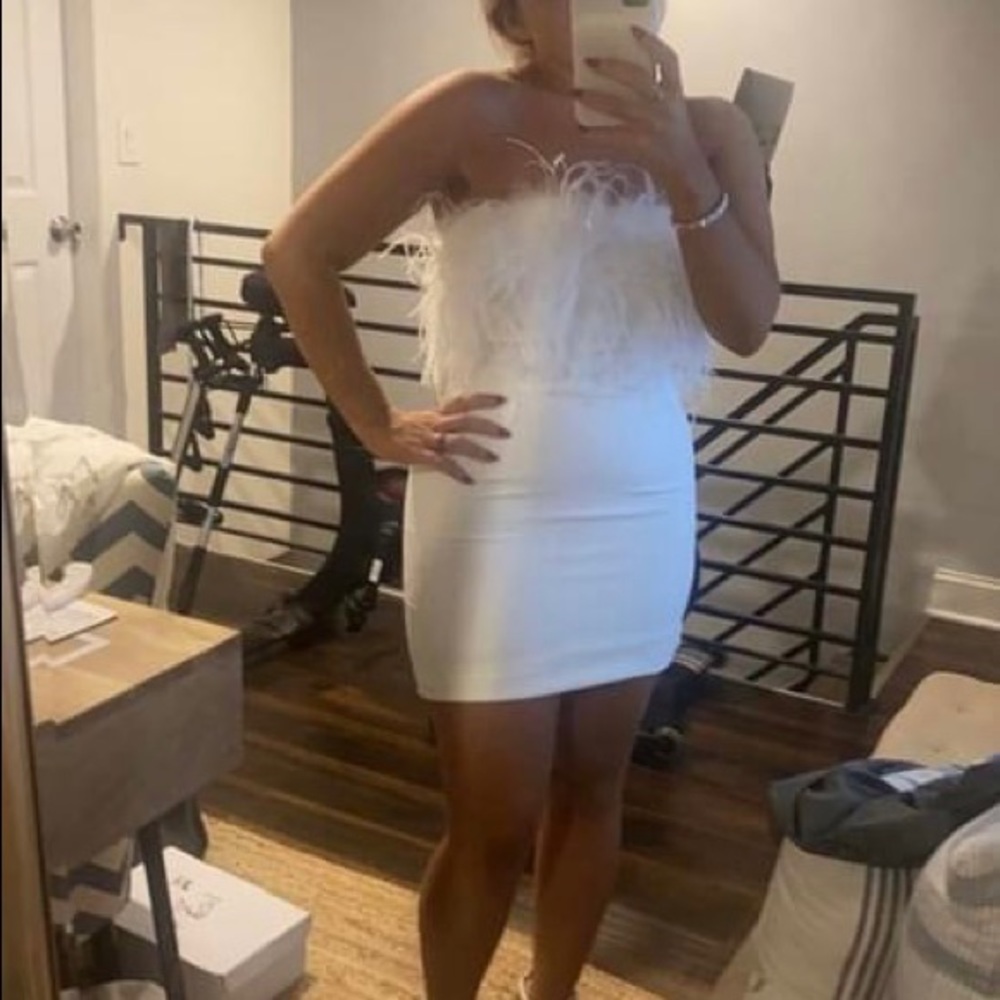 White feather mini dress size small never worn